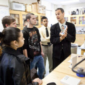 Professor Jed Macosko gives a tour of his lab in Olin Physical Laboratory to students from Atkins Academic and Technology High School.