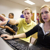 Students in Vicki Clankscales' eighth-grade science class at Hanes Middle School play CellCraft in the school's computer lab.