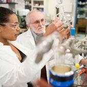 Chemistry professor Ron Noftle works with chemistry major Melissa Donaldson ('10) in his lab in Salem Hall.