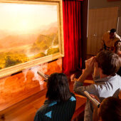 Students view Frederic Church's 1855 masterpiece, The Andes of Ecuador.