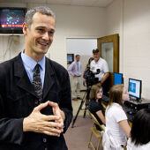 Wake Forest physics professor Jed Macosko introduces middle school students to the game CellCraft.