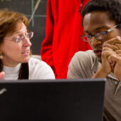 Junior Brandon Turner talks about a research project with his mentor Reynolds Professor of Computational Biophysics Jacque Fetrow, who is also dean of the college.