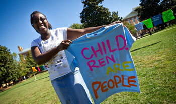 First-year student Dorronda Bordley holds up the t-shirt she painted.