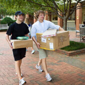 Students walking with packages