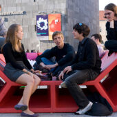 Wake Forest students sit in downtown Vienna.