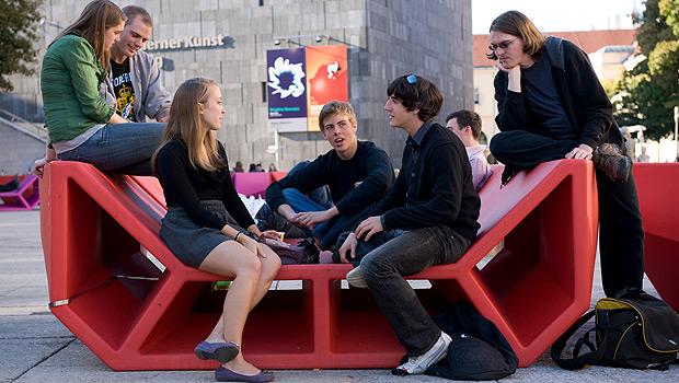 Wake Forest students sit in downtown Vienna.