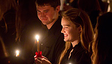 Student with candle