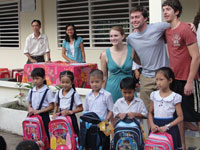 Vietnamese children with new backpacks.