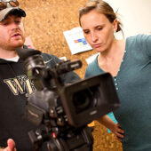 Documentary film program students Sam Smartt (BA '09) and Hillary Pierce work on a short film promoting recycling.