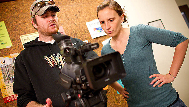 Documentary film program students Sam Smartt (BA '09) and Hillary Pierce work on a short film promoting recycling.