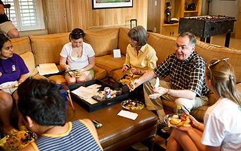President Hatch and his wife, Julie, eat with students. 