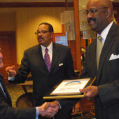 Bill Leonard (left) accepts his award. (Photo courtesy Winston-Salem Chronicle)