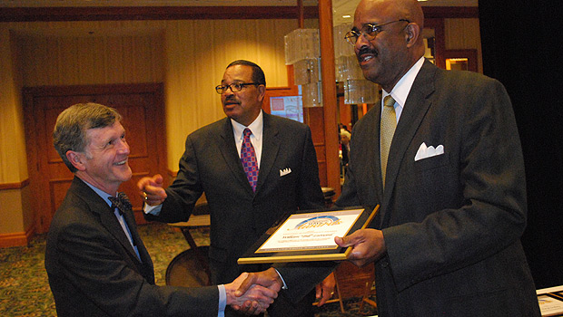 Bill Leonard (left) accepts his award. (Photo courtesy Winston-Salem Chronicle)