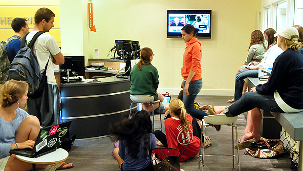 Students watch coverage of Osama bin Laden's death on a television in the Z. Smith Reynolds Library.