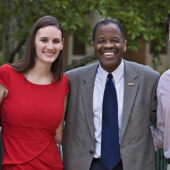 Alexandra Ford (’12), Michael Grippaldi (’11), and Craig Principe (’12) pose with Dean Blake Morant