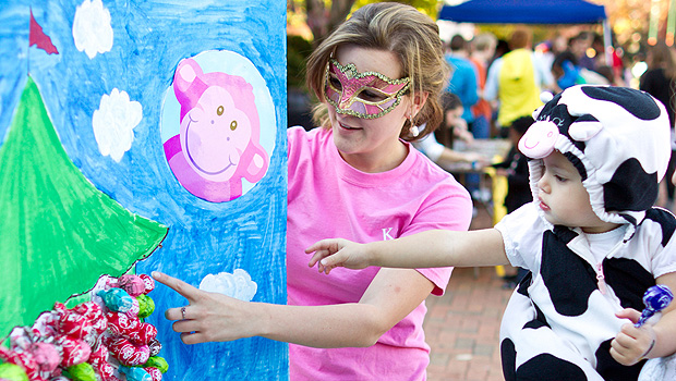 Wake Forest student helps child at Project Pumpkin