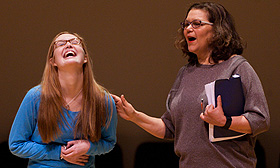 Susan Terry works with student