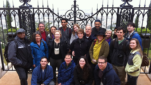 Participants in the Interfaith Pilgrimage to the Holy Land gather in front of the gates at Haifa.