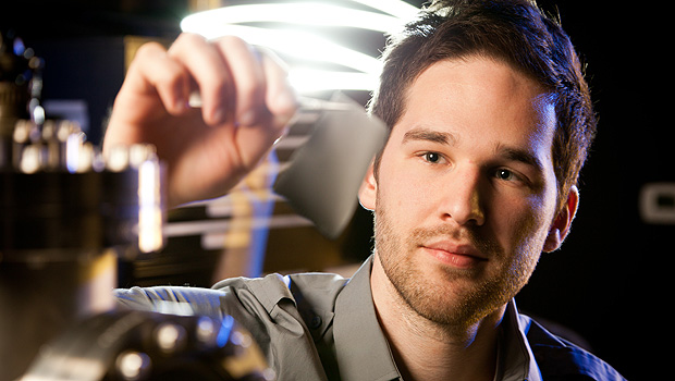 Graduate student Corey Hewitt works with a sample of thermoelectric fabric in the Nanotechnology lab.