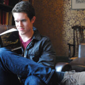 Junior Drew Thies reads in Wake Forest's Worrell House in London.