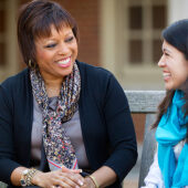 Barbee Oakes, the Assistant Provost for Diversity and Inclusion, talks with students Nancy Aguillon, in blue, and D'Andre Starnes.