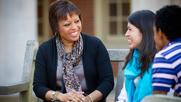 Barbee Oakes, the Assistant Provost for Diversity and Inclusion, talks with students Nancy Aguillon, in blue, and D'Andre Starnes.