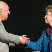 Susan Brinkley ('62) receives the Distinguished Alumni Award from Ed Wilson.