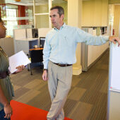 Patrick Sullivan (right) assists senior Brooke Thomas in the Office of Personal and Career Development.