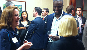 People gather at the networking event.