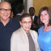 Martin Ginsburg and U.S. Supreme Court Justice Ruth Bader Ginsburg pose with Erin Hartnett ('10) at a reception during part of the Venice Study Abroad Program in 2008.