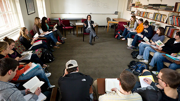 Professor Omaar Hena teaches freshmen in his first-year seminar on globalization and world literarture in Tribble Hall.