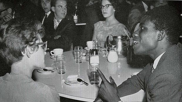 Ed Reynolds talks with fellow students in 1962.