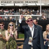 Ben Sutton Jr. and his family acknowledge the crowd after the gift was announced during the Wake Forest-Army football game.