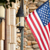 American flag hangs from a WFU building