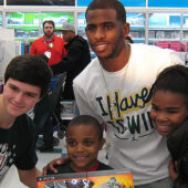 Chris Paul gives back to children at Toys R Us.