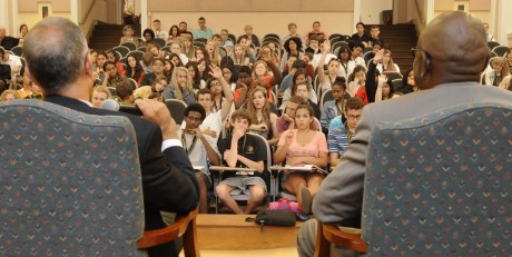 Students at the IB World Conference participate in a Q&A with Darryl Hunt and Mark Rabil. (Photo courtesy of the Winston-Salem Journal.)