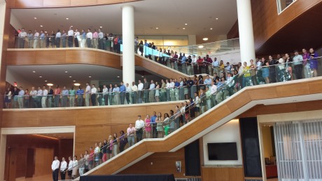 All 140 MA students fill the stairs in Farrell Hall.