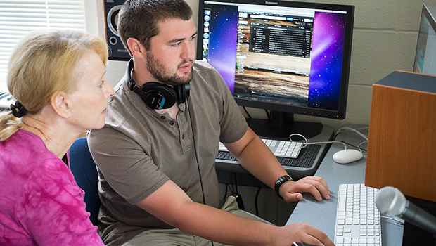 Wake Forest senior mathematics major Jamie Floyd ('14) works with computer science professor Jennifer Burg.