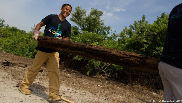 Jamal Garcia ('16) clearing debris at Gateway National Recreation Area.
