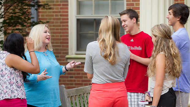 Professor Mary Dalton (second from left) talks with new students.