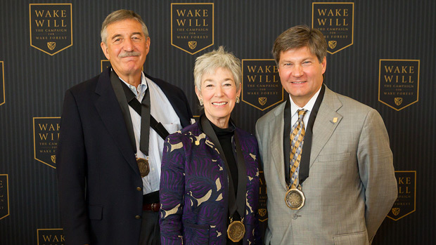 Mike (l) and Debbie (c) Rubin and Bobby Burchfield (r) attend a luncheon in their honor.