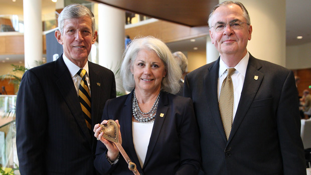 From left: Dean of Business Steve Reinemund, Trustee Mary Farrell (P '10) and President Nathan Hatch.