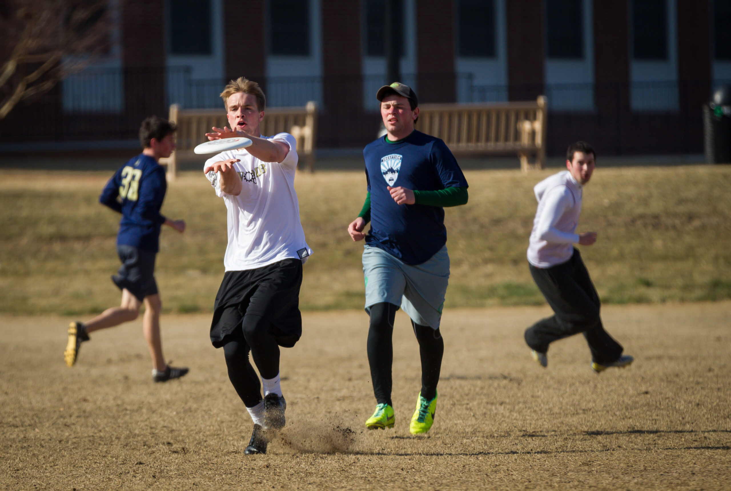 The Wake Forest Ultimate Frisbee team practices on Poteat Field.