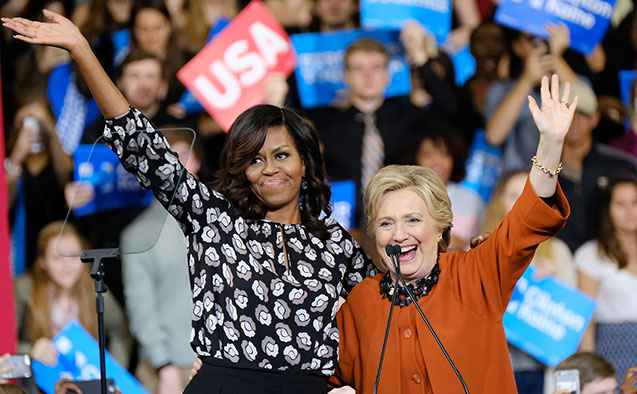 Hillary Clinton (right) and Michelle Obama at a campaign event in Winston-Salem