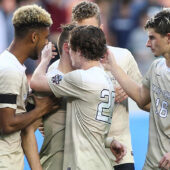 WFU players console each other.