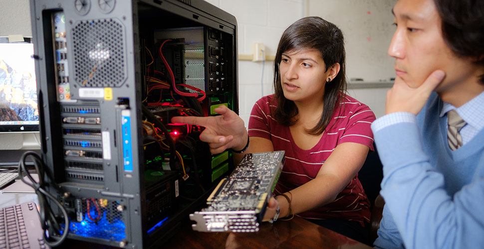 Zuniga (MS ’17) talks with Cho about how a new high-speed video card will help her massively parallel processing projects.