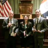 Wake Forest Law students with moot court trophies