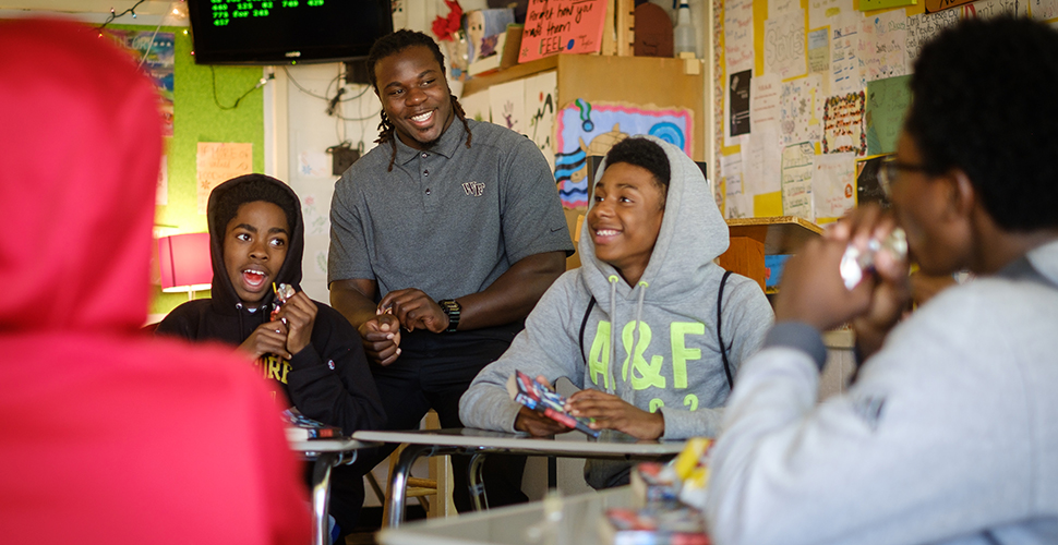 Wendell Dunn speaks with students at Paisely IB Magnet School