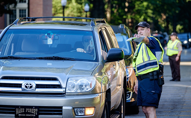 WFU police guide traffic on move-in day.