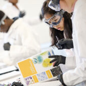 Xiaotian Jiao ('20) works on separating components of a drug using chromatography in her organic chemistry lab at Wake Downtown.